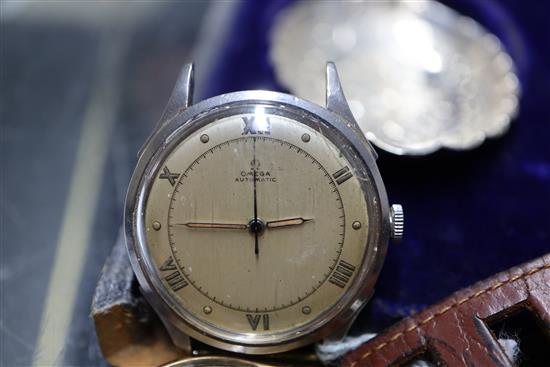 A Tissot gold wrist watch, one other 9ct gold wrist watch and an Omega stainless steel watch head.